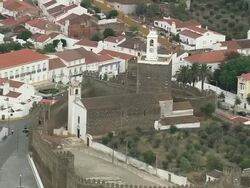 AERIAL WS ZO Townscape with Alandroal Castle / Alandroal, Evora, Portugal Stock Footage