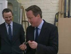 David Cameron Hammering Nail Into Door News Clip