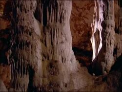 Cave wall formed from merged limestone stalactites and stalagmites, Parque Natural Sierras Subbeticas (Cordoba), Andalucia, Spain Stock Footage