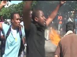 Protesters in Haiti's capital are lashing out at U.N. peacekeepers and the government, blocking roads and attacking foreigners' vehicles. Instructional Video