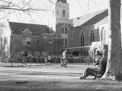 Church exterior, students walking, studying Stock Footage