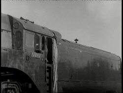 1938 B/W MONTAGE Asia Express train that connects Dairen and Harbin, engineer examines wheel, climbs aboard engine, people wave from platform, conductor takes tickets from passengers who smile, sleep and read / Manchuria
 Stock Footage
