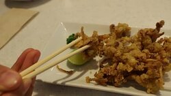Eating fried squid japanese food Stock Footage