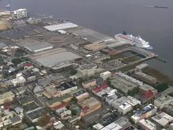 MS AERIAL Shot of cruise ship at dock in Charleston city / South Carolina, United States Stock Footage