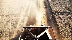 Cultivation through Tractor in the field Stock Footage