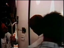 1962 close up two men preparing Telstar for launch (first communications satellite) / documentary Stock Footage