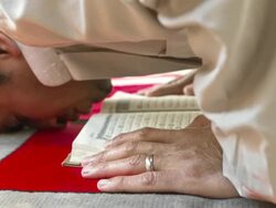 HD: Muslim Man Prostrating With Koran Stock Footage