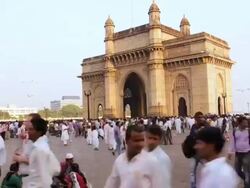 WS T/L View of People visit Gateway of India monument built during British raj / Mumbai, India Stock Footage