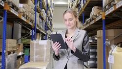Beautiful woman checking the stock Stock Footage