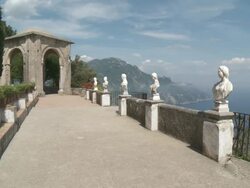 WS TD Marble busts of terrace of infinity at garden of villa Cimbrone with Tyrrhenian sea / Ravello, Campania, Italy Stock Footage