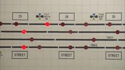Lights help monitor a subway car tracking board. Stock Footage