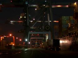 WS Large cranes in nice sequence at dock in night sequence / Djibouti Stock Footage