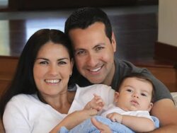 MS Portrait of Proud Parents Holding Baby / Richmond, Virginia, USA Stock Footage