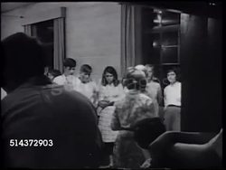 1966: STARK DILLARD: VS Teenagers dancing at church sponsored dance, conservative clothing, some talking, others dancing, slow dancing. VS Stark talking w/ teens. [VO Stark on issues for teens, uncertain, questions about God, free will to question.] Instructional Video