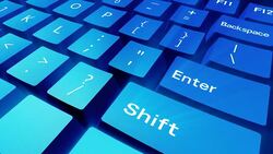 Computer keyboard under blue light. Stock Footage