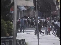 Riots and mortar fire follow arrest of Muslim militant News Clip