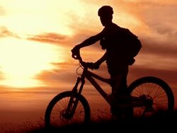 HD Super Slow-Mo: Cycler Enjoying The View At Sunset Stock Footage