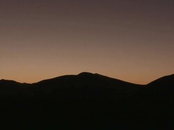 Silhouetted sand dune, Sossusvlei, Namib-Naukluft, Namibia Stock Footage