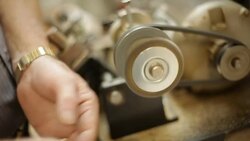 Locksmith is making a copy of key Stock Footage