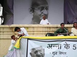 MS Singers singing in Anna Hazare's indefinite fast and Anna Hazare sitting on stage in background at Ramlila Ground AUDIO / Delhi, Delhi, India Stock Footage