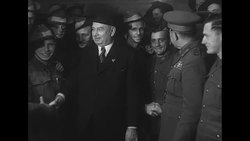 Australian government official talking with Australian troops before they leave for Korean War News Clip