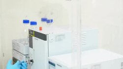 Scientists Working and using gel permeation chromatography in the Laboratory Stock Footage