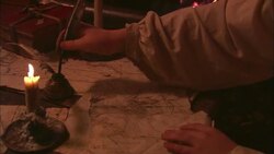 A scribe adds details to a map. Stock Footage