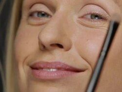 CU Woman doing own full makeup / Copenhagen, Denmark Stock Footage