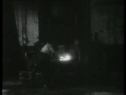 Manganese steel resists hard wear.  Tools used for heavy work are made of this alloy.  Steel workers, UK 1939 Stock Footage