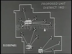 1950: EUREKA SCHOOLS: Artist rendering of proposed wing addition. CHART Showing consolidation. EXT Congerville school. Inscription 'Consolidated School 1908' over doorway. Town street scene. DRAMATIZATION: Men w/ feed truck talking about consolidation Instructional Video