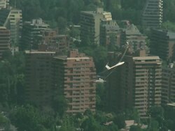 2010 AERIAL Glider flying over suburbs and rocky foothills of the Andes / Santiago de Chile, Gran Santiago, Chile Stock Footage