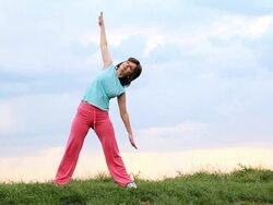 Young woman exercising outdoor. Stock Footage