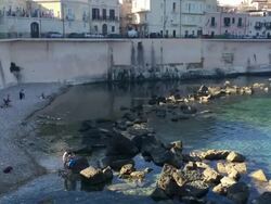 A small beach in Syracuse, Sicily Stock Footage
