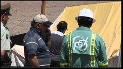 Freed miner returns to scene; intvs with two miners, party clean-up News Clip