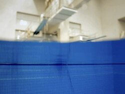 High Diver jumping into the water Stock Footage