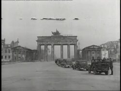 Military officers assess the damage to the Brandenburg Gate and Adlon Hotel. News Clip