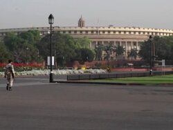 The Indian armed forces personals manning the building of the Parliament of India at the Sansad Marg or the Parliament Street in New Delhi, India Stock Footage