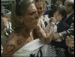 JAPAN: 2 NAKED AMERICAN WOMEN STAGE ANIMAL FUR SALE PROTEST News Clip