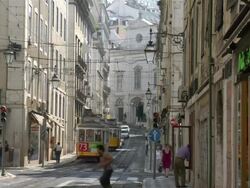 WS View of trams moving at Conceicao street / Lisbon, Portugal Stock Footage