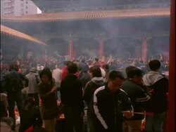 People praying inside the Wong Tai Sin Temple, Chinese new year, Wong Tai Sin Temple, Hong Kong Stock Footage