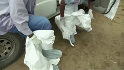 A task force in Monrovia, Liberia work to see if a recently deceased person was infected with the deadly Ebola virus. (Oct. 4) Instructional Video