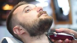 brutal barber clipper mows bearded hipster Stock Footage