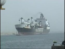 US Navy-contracted ship opens fire on boats in the Suez Canal News Clip
