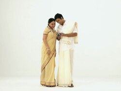 South Indian couple taking picture of themselves with a camera  Stock Footage