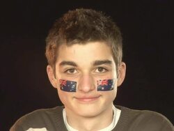 Smiling Patriotic Australian male - HD & PAL Stock Footage