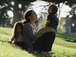 USA, California, San Francisco, Alamo Square Park, Mother with two children (2-3, 4-5) in park Stock Footage