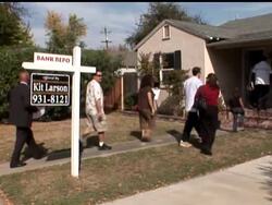 Wall Street pulled back Tuesday as investors uneasy after a drop in consumer confidence traded cautiously ahead of the Federal Reserve's rate decision. News Clip