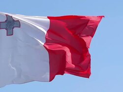 MS SLO MO Shot of Malta flag waving in wind / Caen, Normandy, France Stock Footage