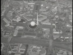 The Trylon and Perisphere occupy the center of the World's Fairgrounds in Flushing Meadows, Queens, New York. News Clip