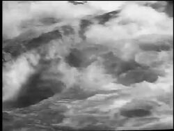 B/W 1961 kayaker on river rapids capsizing in slalom competition / Czechoslovakia / news. Stock Footage